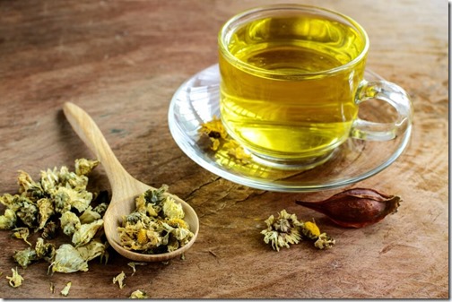 Chinese Chrysanthemum Tea on old wooden table
